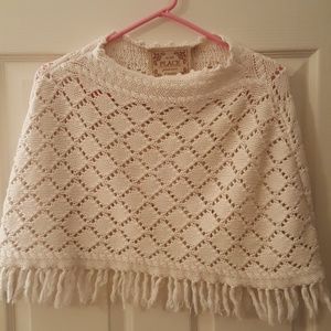 Cream colored girl's poncho